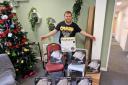 John Borg, 30, with the PlayStation boxes found