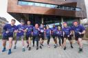 Pictured outside the Southampton Clinical Trials Unit, researchers are each running 1000km during 2024 for Cancer Research UK.