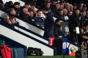 West Brom's Carlos Corberan walks off into the tunnel after being shown a red card against Southampton