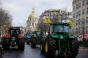 Farmers staged their protest on the eve of a major agricultural fair in Paris (Thomas Padilla/AP)