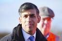 Prime Minister Rishi Sunak arrives to visit a location on the site of the future Haxby railway station near York (Jon Super/PA)
