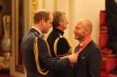 Former England and Newcastle striker Alan Shearer is made a CBE by the Duke of Cambridge during an Investiture ceremony at Buckingham Palace. PRESS ASSOCIATION Photo. Picture date: Tuesday December 6, 2016. See PA story ROYAL Investiture. Photo credit