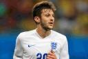 Adam Lallana in action for England