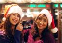 Friends Anita Sharma and Satvir Kaur get into the Christmas spirit.