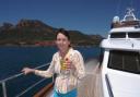 SOAKING UP THE SUN: 2009 Cruise the Coast winner Isobel Butler aboard SALU.