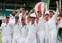 England captain Andrew Strauss lifts the Ashes Urn