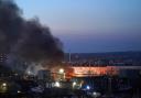 The fire in the industrial estate opposite St Mary's Stadium continued into the night