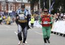 Batman and Robin run a previous ABP Southampton Marathon