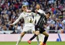 Real Madrid's Toni Kroos vies with new Saints' signing Juanmi Jiménez