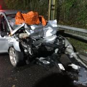 Driver arrested after car collides with parked lorry. Credit: Hants Roads Policing