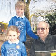 Pupils Naomi Eldridge and Hugh Baldwin with site manager Cliff Loch from Wordsworth Infant School who are hoping to get some benches built in their grounds,
