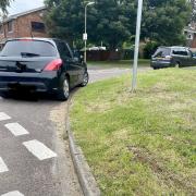 Parents of school children parking too near to a junction in Bishop's Waltham. Photo from: WinchesterCops/Twitter.