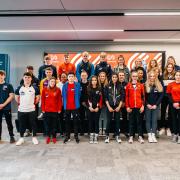 Tilly attended a workshop in London where she met other athletes.