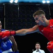 Wales' Taylor Bevan (Red) and Samoa's Jancen Poutoa during the Men's Light Heavy (75-80kg) at The NEC on day four of the 2022 Commonwealth Games in Birmingham. Pic: PA Images