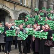 ANGRY: Campaigners on the steps of Winchester Guildhall yesterday.