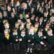 CELEBRATING: Head teacher Amanda Jones with Stanmore Primary pupils. Echo picture by Chris Moorhouse. order no: 11884915