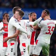 Southampton's Jan Bednarek (right) and James Ward-Prowse celebrate after the Premier League match at Stamford Bridge, London. Picture date: Saturday February 18, 2023.