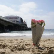A floral tribute has been left near the scene of the tragedy