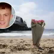 A floral tribute left on Bournemouth Beach. INSET: Joe Abbess