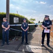 Officers at the scene of the Eastleigh stabbing. An alley between Shelley Road and Tennyson Road was also cordoned off.
