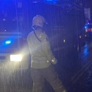 Fire crews battled the weather conditions and rescued residents that had become trapped trough the night