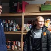 Hampshire's new signing Ali Orr and Southern Vipers' Alice Monaghan visited the local food bank.