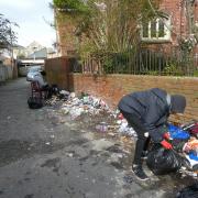 Could a seven-year battle to remove fly-tipping from an alleyway finally be over?