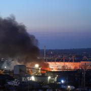 The fire in the industrial estate opposite St Mary's Stadium continued into the night