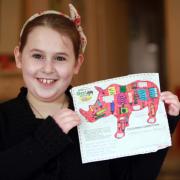 Jessica Preston and her winning entry for Go! Rhinos