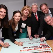 Candidates sign a pledge at the hustings at University of Southampton Science Park