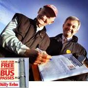 Pensioner Reg Cave is pictured signing the petition with Mr Huhne.