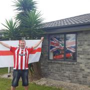 Russell Budden who is flying 11,000 miles from New Zealand for Saints game against Manchester United at Wembley on Sunday