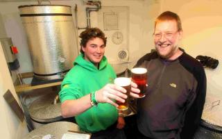 Andy Mansell (left) and brewing expert Iain McIntosh of Red Cat Brewing in 2012