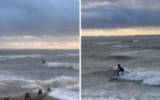 Daredevil surfer Gregory Placidi riding the waves at Hill Head during Storm Henk