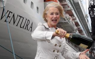 Dame Helen Mirren with a bottle of Champagne in front of P&O Cruises Ventura ship ahead of the official naming ceremony. PRESS ASSOCIATION Photo. Picture date: Wednesday April 16, 2008. Two Royal Marine Commandos will smash bottles of Champagne against