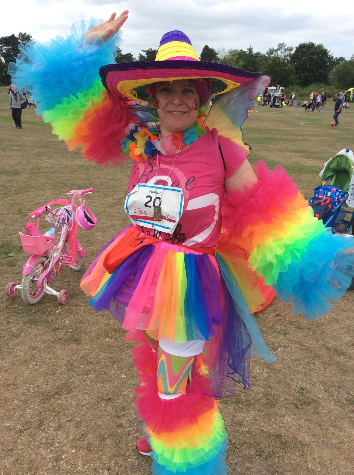 Colourful lady Joanne Cook from Thornhill poses at the Race For Life event in The Common. She is taking part in memory of her parents.