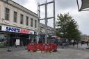 Large advertising board under construction on Above Bar Street