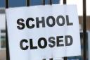 File photo of a school closed sign.