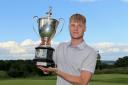 Stoneham’s James Freeman with the Sloane-Stanley Challenge Cup after winning  117th Hampshire, Isle of Wight and Channel Islands Amateur Championship final beating Bramsahw’s Joe Buenfeld at the 21st hole, at Stoneham Golf Club on Sunday, May