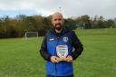 Aaron Evans and his Mutual Respect Award trophy