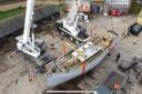 The Ark being craned into the farmyard