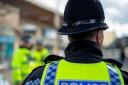 Two men have been charged after a man in his 50s was seriously assaulted during an alleged robbery attempt in Gosport.