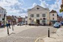 The pretty market square still hosts artisan stalls. (c)  Alison Day