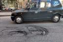 Potholed road in Glasgow city centre