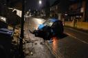 The aftermath of a car colliding with a telegraph pole on Woodmill Lane