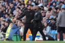 Southampton manager Russell Martin (left) reacts as he speaks to fourth official Sam Allison during the match