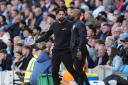 Southampton manager Russell Martin reacts as he speaks to fourth official Sam Allison