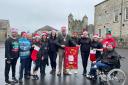 Chair of Fermanagh and Omagh District Council, Councillor John McClaughry with members of 'JustUs'