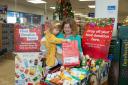 Tesco communications manager Jessica McCulloch with her daughter at one of the collections