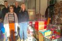 Foodbank volunteers are Nick Sandy (top left) and Richard Auger (top right), Gintare Budvytyte bottom left and Jennifer Appleton bottom right